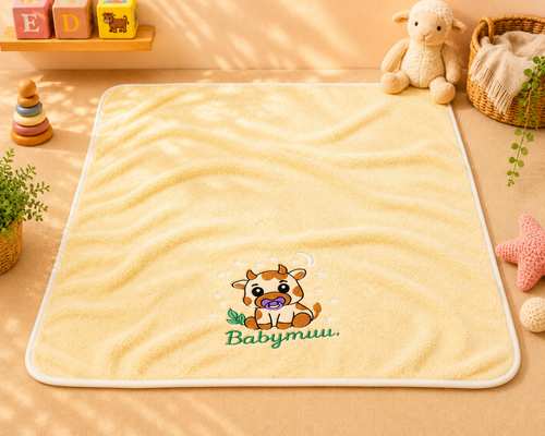 LumiMuu® – Manta que Brilla con Amor